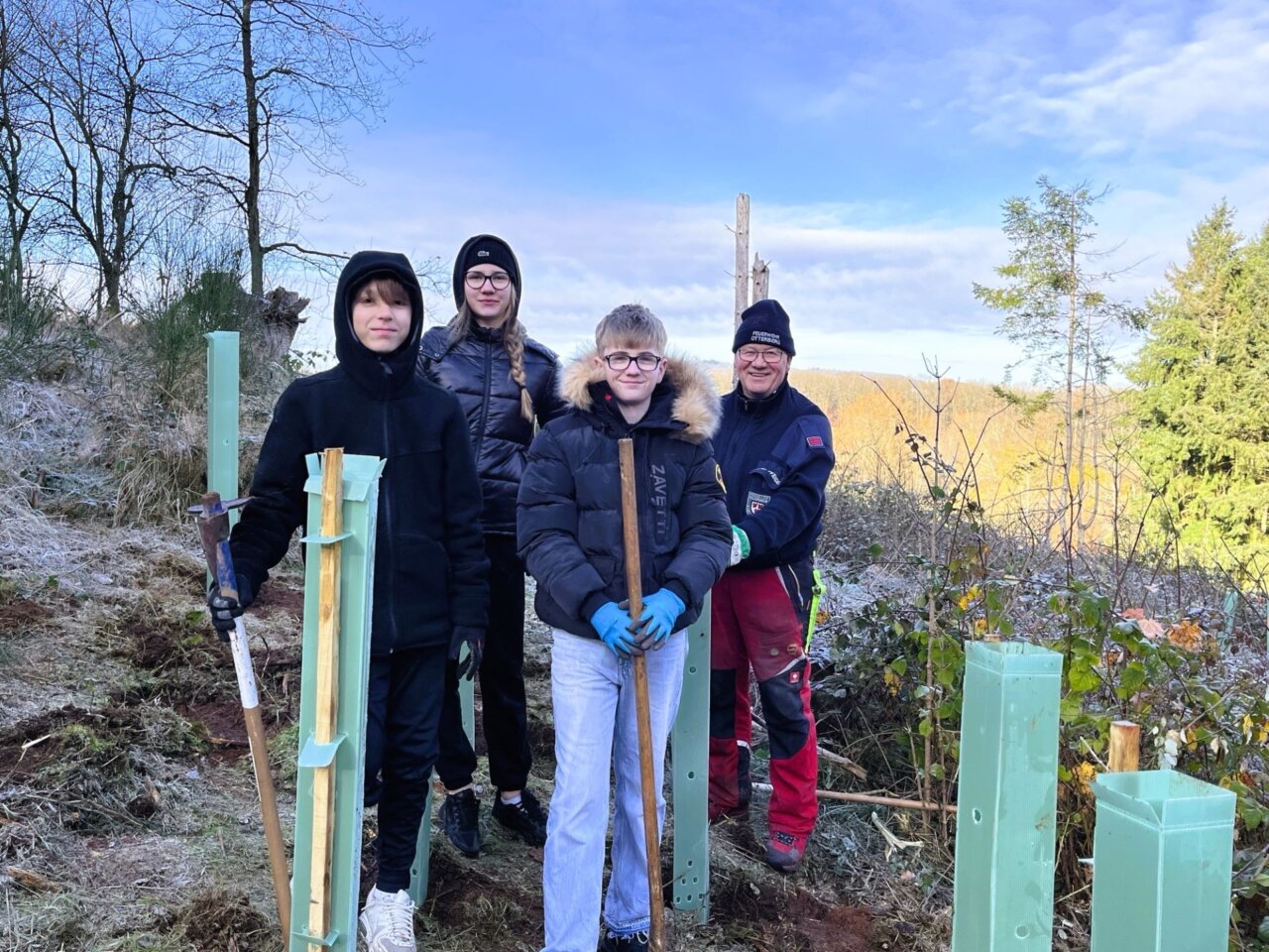 Dreier-Team mit Betreuer